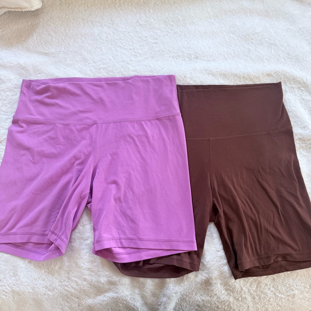 Aritzia TnA action 
Women's mauve Purple and Brown biker Shorts